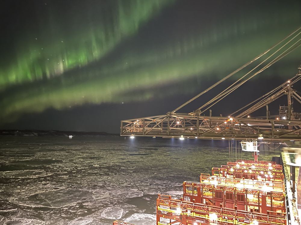 Northern lights over the cranes at the Port of Alaska